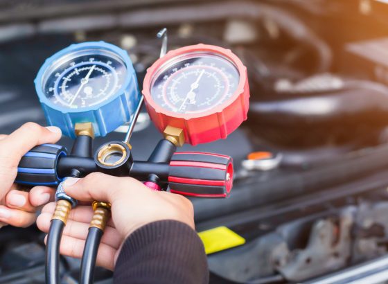 technician repairing cooling system