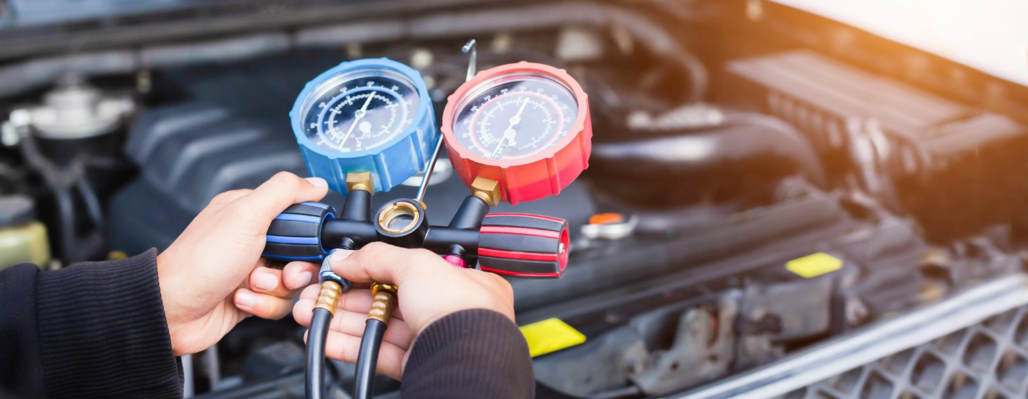 technician repairing cooling system