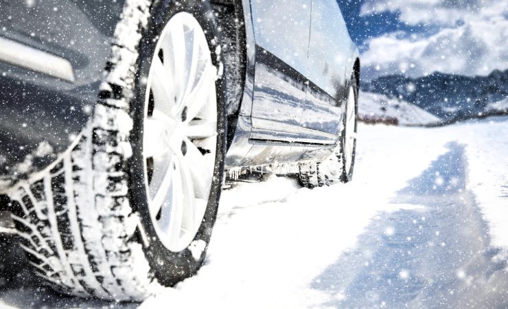 Car with winter tires in the snow