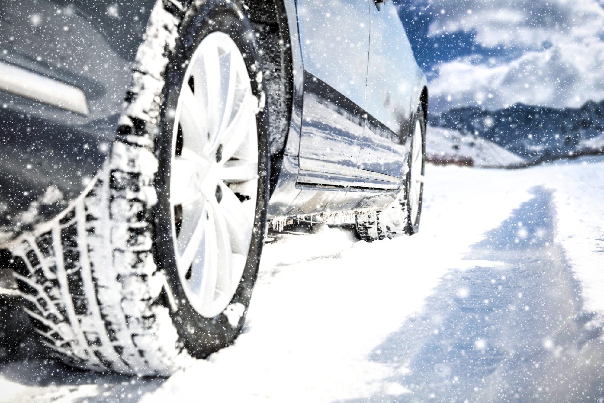 Car with winter tires in the snow